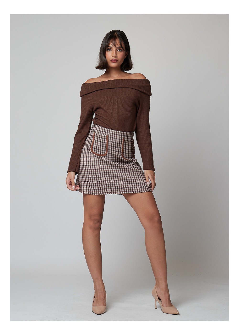 Falda corta cuadros ribete bolsillos