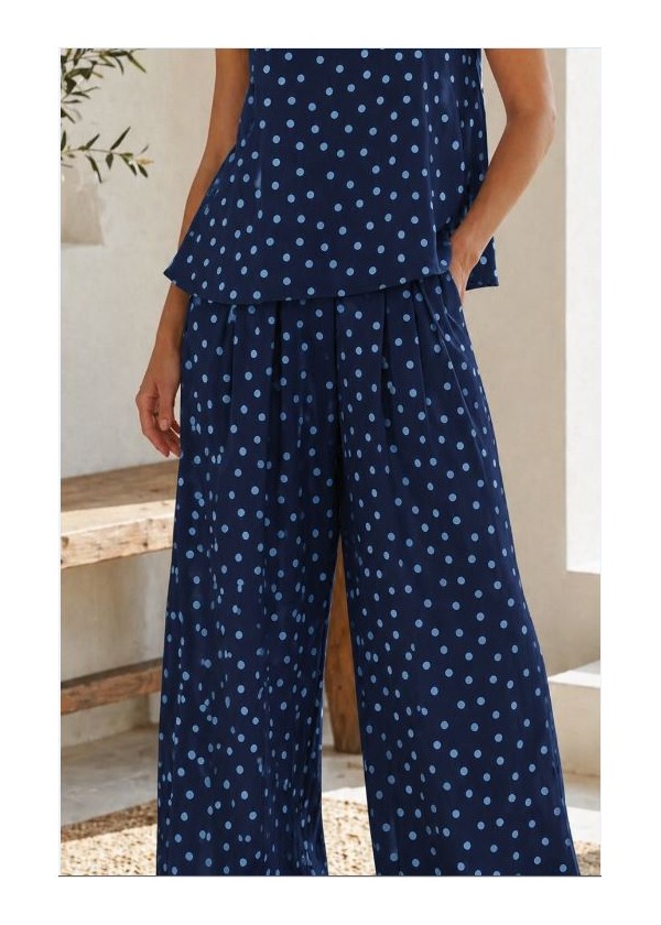 Pantalón ancho goma cintura y bolsillos lunares azules