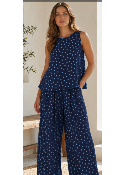 Pantalón ancho goma cintura y bolsillos lunares azules