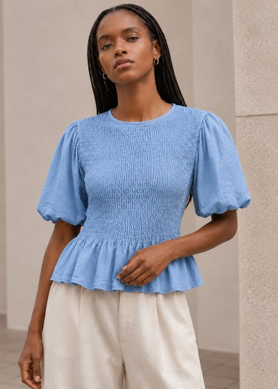 Blusa nido de abeja manga...