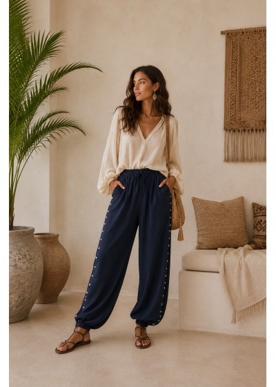 Pantalon tachas laterales