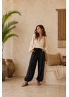 Pantalon tachas laterales